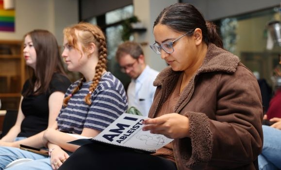 students looking at new medical resource