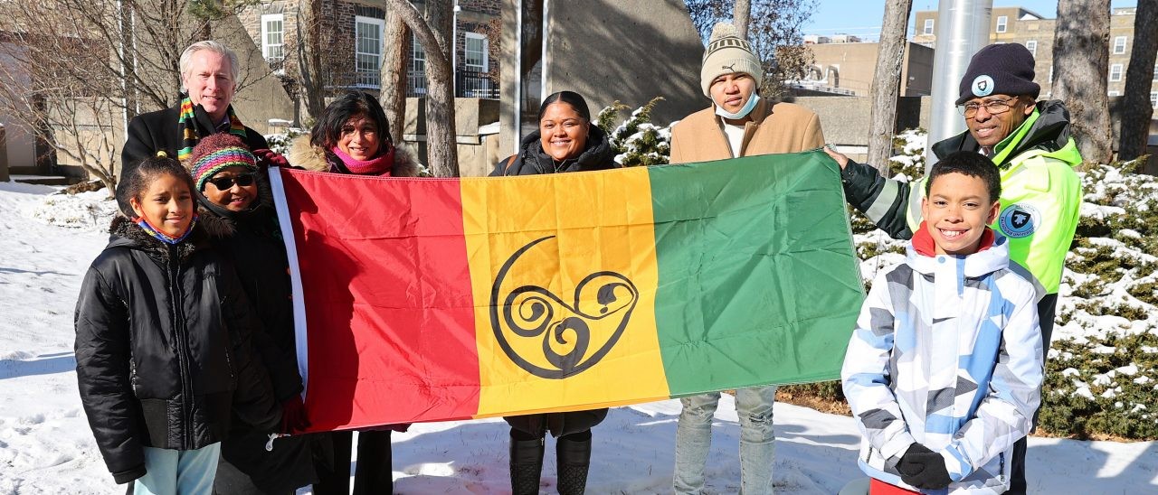ans-community-members-holding-ans-flag