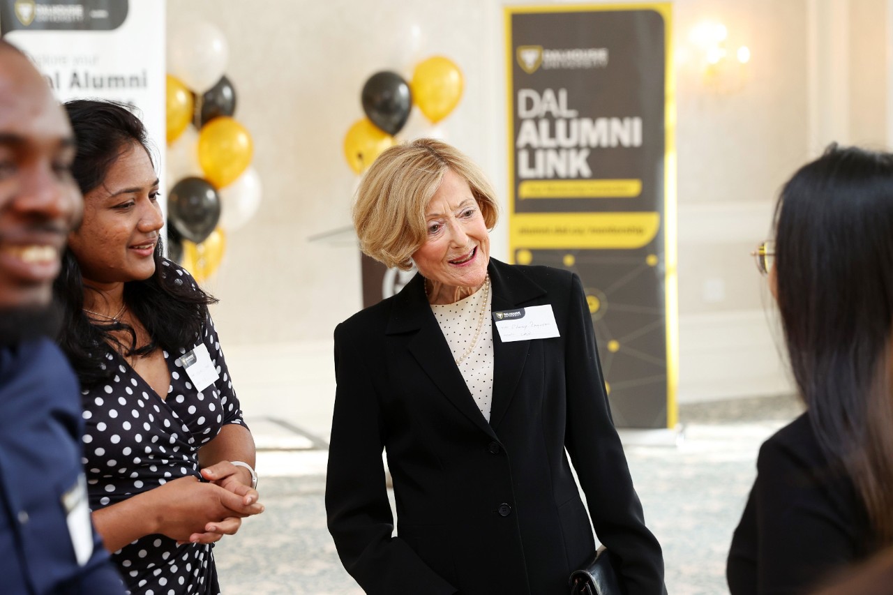 Ferguson mingling with attendees at an event.