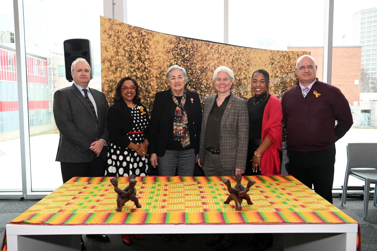 A group of Dalhousie leaders stand with key members of partner groups in the announcement.