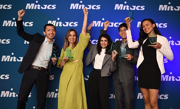 Rafaela Andrade, second from left, celebrates her Outstanding Entrepreneur Award at last week's Mitacs gala. 