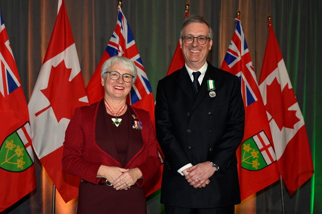 Roger Harris receiving his medal in Ontario.