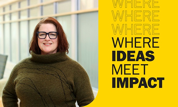 On the left, Dr. Shannon Sterling is wearing a dark green turtle neck sweater, black glasses, and smiling at the camera. On the right, the background is gold and the text 'where ideas meet impact' is displayed in all caps.