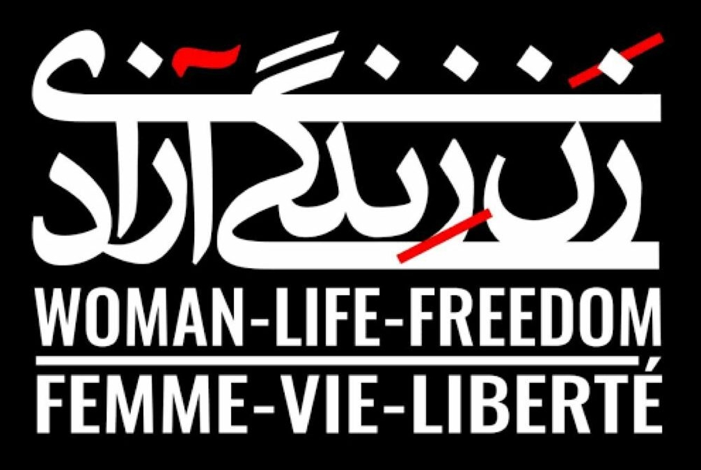 White text reading Woman-life-freedom and femme-vie-liberte on a black background