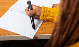 Student using a text to speech pen Student using a text to speech pen