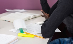 Student taking notes