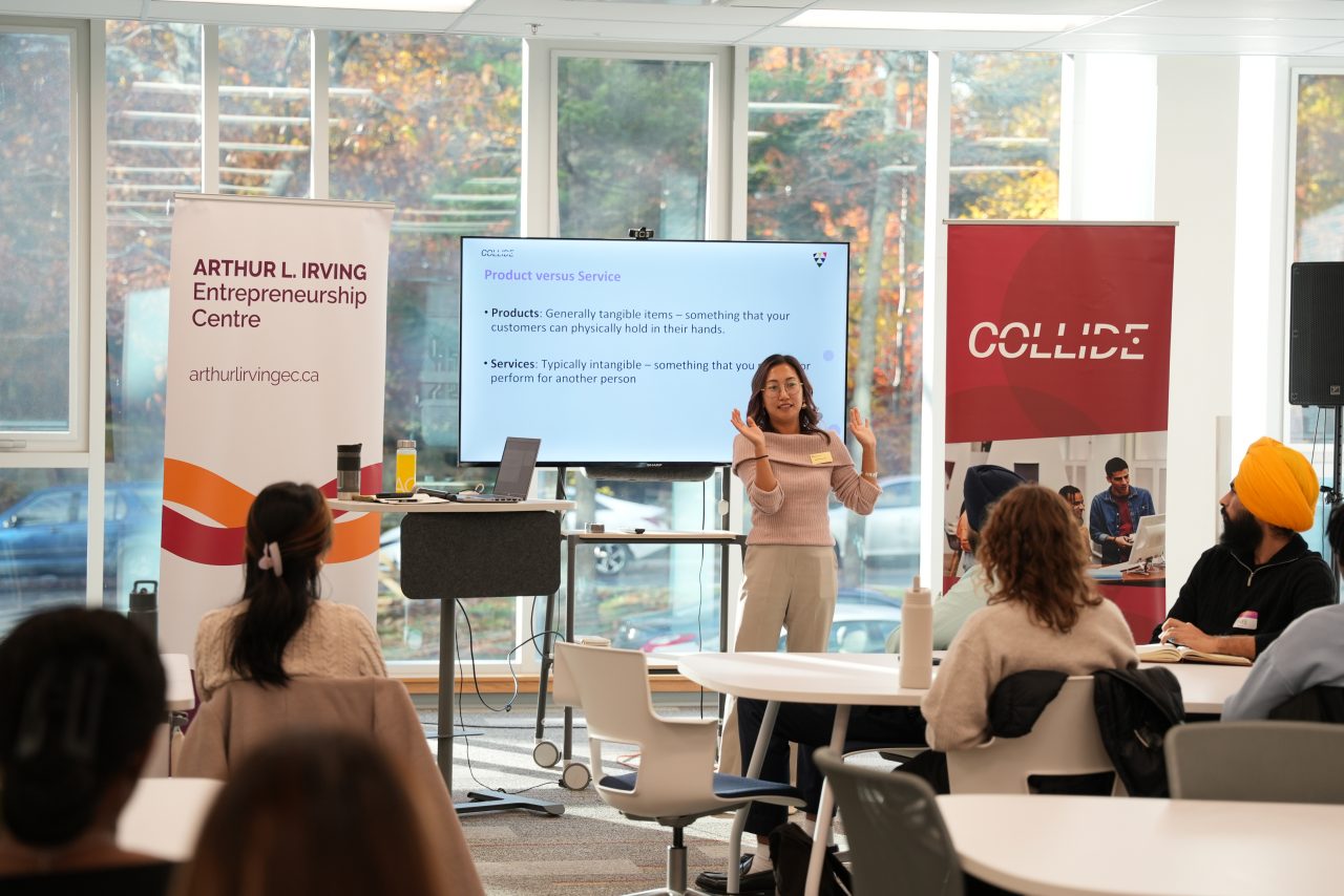 Speaker presenting at a COLLIDE event