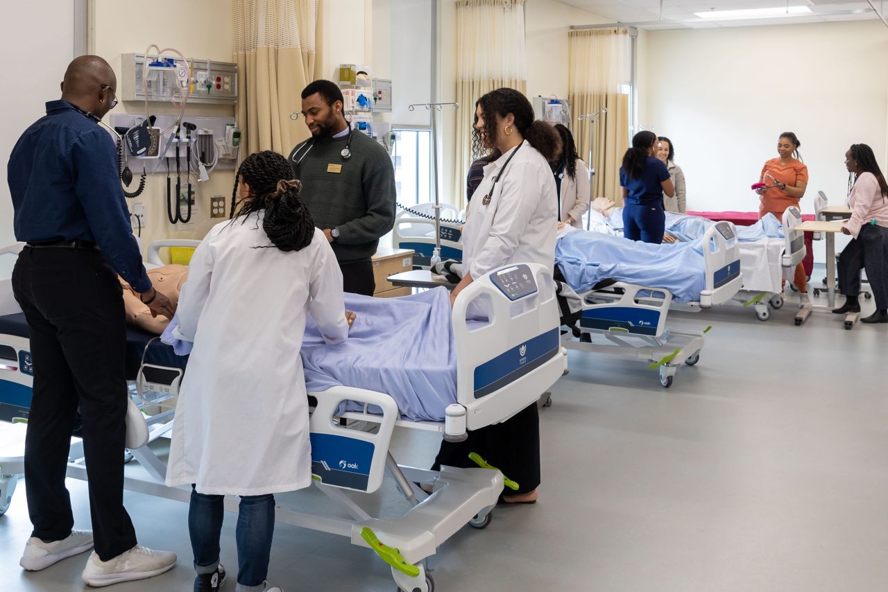 Health students in simulation lab.