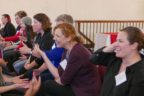 A group of people participates in a stakeholder engagement session hosted by the Healthy Population Institute.