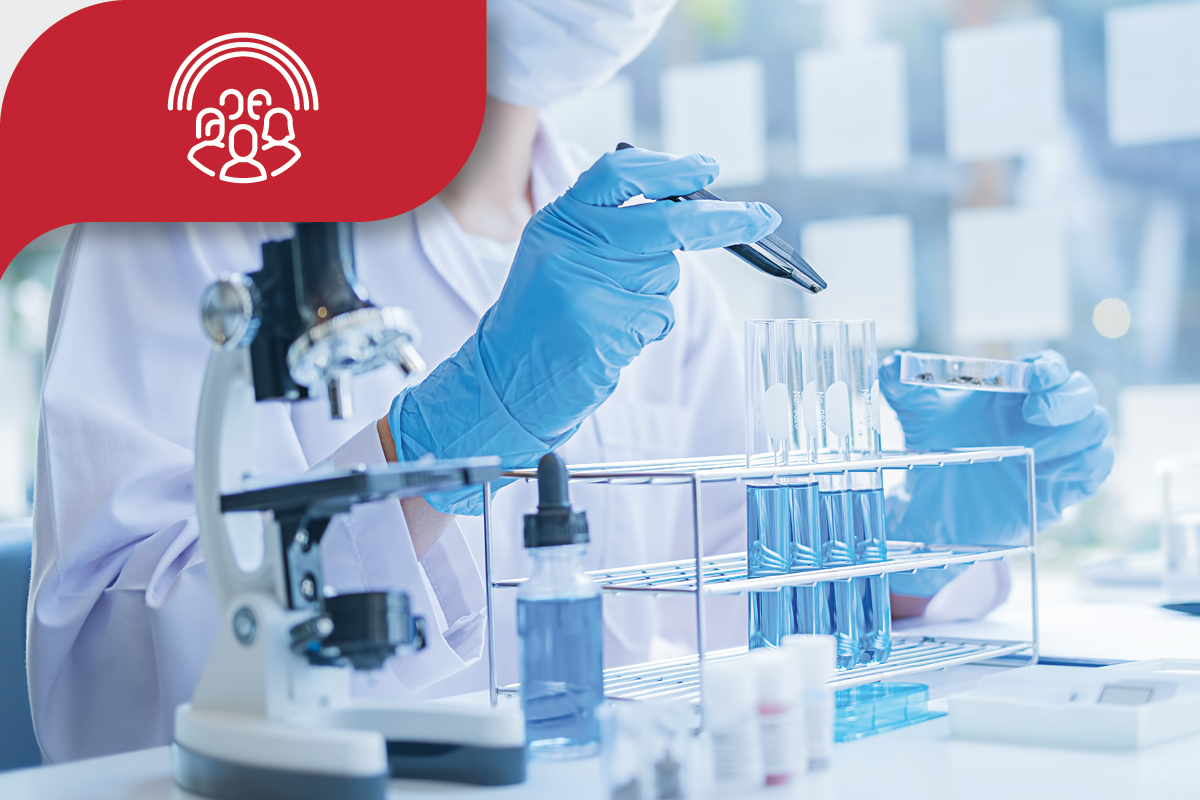 Scientist using a pipette in a lab, symbolizing medical research and innovation.